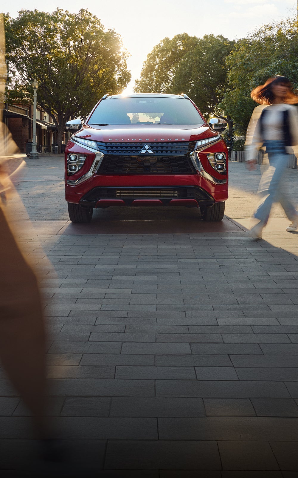 Front view of a red 2026 Mitsubishi Eclipse Cross compact SUV
